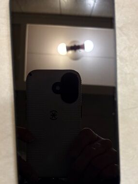 IPhone 14 with accessories cases and watch